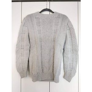 Handmade cable-knit sweater